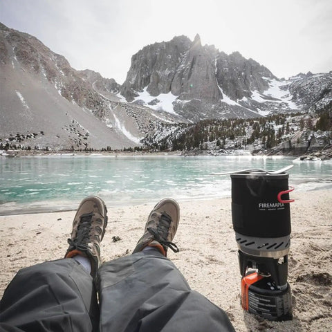 Fixed Star 1 Backpacking Stove System With Propane Cooking Gear Portable Pot And Jet Burner Set by a snowy mountain lake