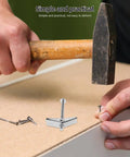 Using a hammer with Heavy Duty Toggle Bolts Kit With Galvanized Iron Wing Nuts And Twenty Four Screws For Drywall Anchors
