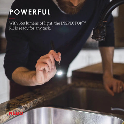 Person using EDC Pen Light Flashlight 360 Lumens, Rechargeable USB or AAA Powered, illuminating under kitchen sink