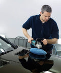 Man using 20 Piece 9 To 10 Inch Car Polisher Bonnet Pads Microfiber Polishing Pad Covers For Orbital Buffers on car hood