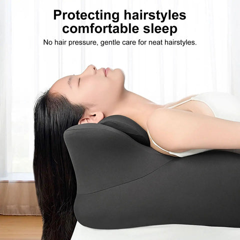 Woman resting on 27 Degree Ergonomic Memory Foam Prone Pillow For Sleeping With Face Down Design Ideal For Stomach Sleepers Aligns Neck And Spine Reduces Back Tension Provides Cozy Bed Reading And Nap Support, grey color, head reclined.