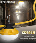 Heavy Duty 120Ft LED Construction String Lights With 12 Waterproof Bulbs, shown lit in a tunnel with 13200 lumens brightness.