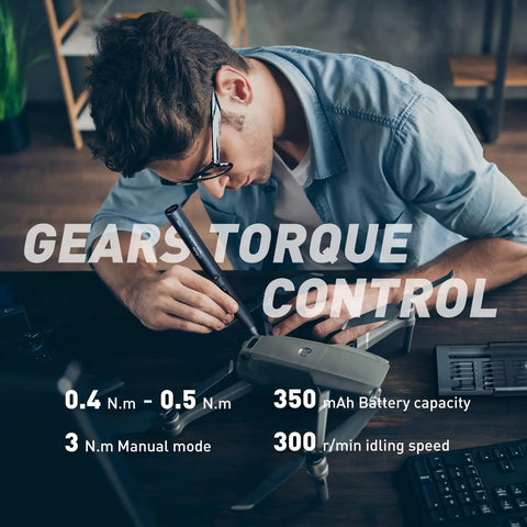Man using Newest 51 In 1 Mini Cordless Precision Screwdriver Kit With S2 Steel Magnetic Bits for electronics repair on drone