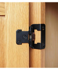 Set Of 2 Overlay Partial Wrap Cabinet Door Hinges installed on wooden cabinet, one color finish, easy install for kitchen cabinets