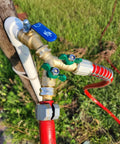 Brass Garden Hose Splitter With Full Port Valve For Maximum Flow Built To Last Two Way High Flow Y Connector All Metal Outdoor Faucet Splitter With Shutoff Durable Water Hose Adapter And Connector mounted on outdoor hose line