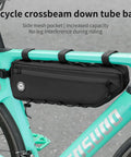 Black 3L large bike frame bag with a 7 inch phone pocket waterproof 600D fabric four point anti sway straps on green bike frame.