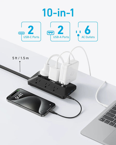 Sleek Power Strip With 300J Surge Protection And 5 Foot Extension Cord Serving Up Pretty Dang Fast Charging Across Six AC Outlets Paired With Dual USB A And Type C Ports For A Smooth No Stress Desk Setup on a desk with devices.