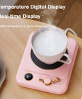 Smart Electric Mug Warmer With Three Heat Modes And Automatic Shutoff Keeps Your Daily Brew Piping Hot Without The Burn. Pink digital display with steaming cup.