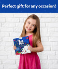 Child holding Foil Fun Letter And Number Sticker Set For Mess Free Arts And Crafts Projects in red dress against brick wall.