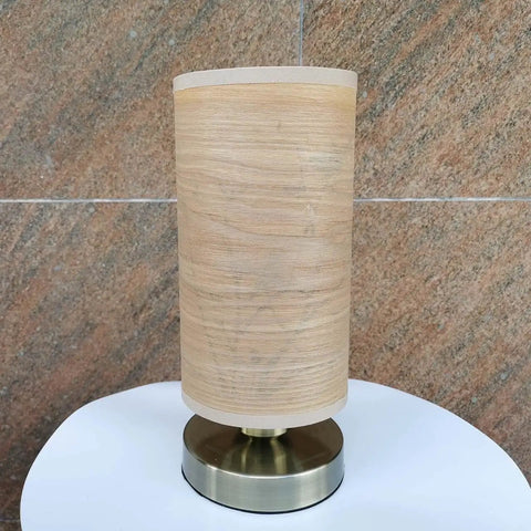 Birds In A Tree Wood Table Lamp With Wood Lampshade And Bronze Metal Base on white surface, 5-inch diameter, 9-inch height