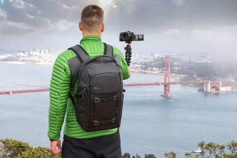 Person overlooking bridge with Freeline Camera Backpack 350 AW With QuickShelf System 3 Tier Shelving Or Flat Fold Weatherproof Nylon