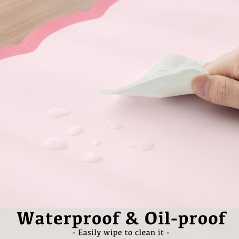 Close-up of Oversized Pink Scalloped Desk Pad For Keyboard And Mouse, 31.5 Inch By 15.7 Inch PU leather showing waterproof checkered pattern.