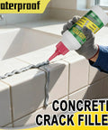 Heavy Hitter Concrete Crack Filler Water Based Sealer applied to a tile crack, showing its gray sealant and ease of use.