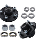 Two black, 5-bolt trailer hub assemblies with bearing kits, seals, and spacers.