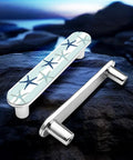 Blue Starfish Cabinet Pulls 4 Pack Center To Center Three Quarter Inch Silver Nautical Drawer Handles on rocks