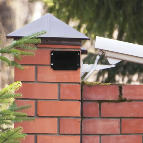 Waterproof Electrical Junction Box Enclosure 115x90x55mm with mounting ear installed on outdoor brick wall for switch control