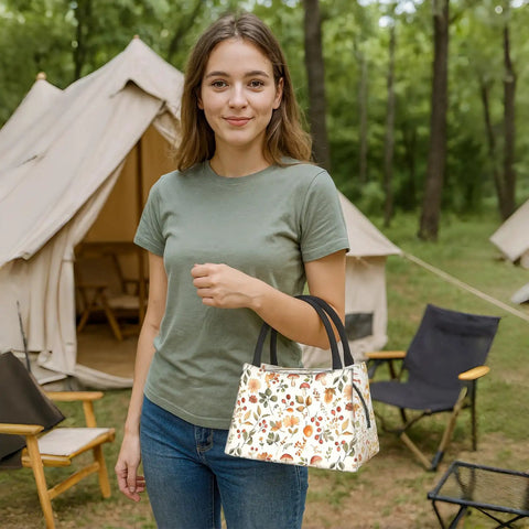 Woman holding Fennec Fox Insulated Lunch Box with large ears for women and girls, camping backdrop, pastel desert plants design.