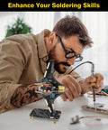Man using soldering iron on DIY Spaceship Soldering Practice Kit With LED Light Modules for skill enhancement.