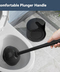 Heavy Duty Toilet Plunger With Wall Holder For Standard Bathroom Drains Extendable Rubber Cup Sink Tub Shower Clog Buster Rock Solid Plumbing Fix No Sweat Quick Drain Repair Tool Black Finish in use with comfortable handle and holder.