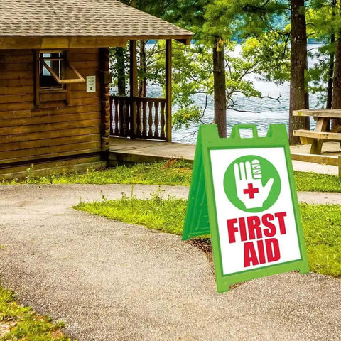 Signicade Deluxe A Frame Double Sided Folding Sidewalk Sign With Quick Change System outdoors by a cabin and lake.