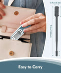 Compact 2-In-1 Nose Hair Trimmer With Dual-Sided Blade And Cleaning Brush being placed in a purse, perfect for travel.