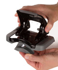 Built Different Two Hole Punch Crushes Twenty Sheets Like Nothing Else With Smart Touch Low Effort Grip held with hands.