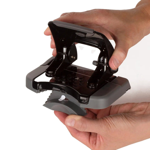 Built Different Two Hole Punch Crushes Twenty Sheets Like Nothing Else With Smart Touch Low Effort Grip held with hands.