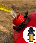 12V 75W Electric Fuel Transfer Pump Self Priming Portable 110 GPH Gasoline and Diesel Transfers For Cars Trucks Boats Tractors and Farm Equipment Perfect For All Your Fuel Transfer Jobs next to a red fuel container on grass.