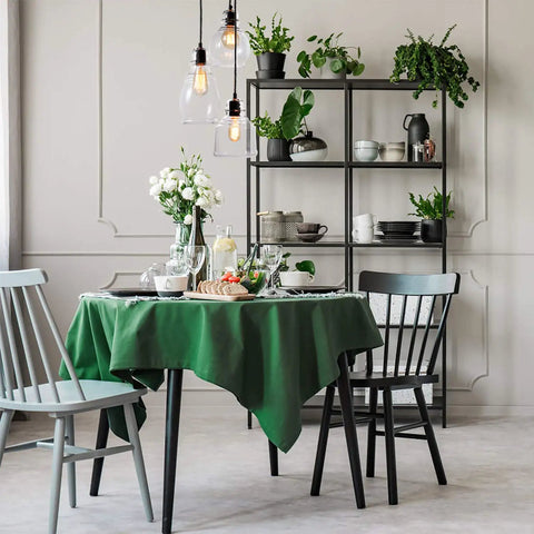 Dining room with Cool Three Light Glass Pendant Cluster With Adjustable Height UL Listed, hanging over a modern table setting.
