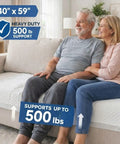 Heavy Duty Disposable Bed Pads 40X59 Inches Extra Large Underpads For Adults Bariatric Incontinence with couple on couch.