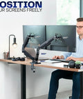 Dual Monitor Stand With Fully Adjustable Arms For 17 To 32 Inch Screens, Mechanical Articulating Desk Mount For Gaming And Office Setups, VESA 75x75 And 100x100, Supports Up To 19.8 Lbs Per Monitor, Black, shown holding two monitors