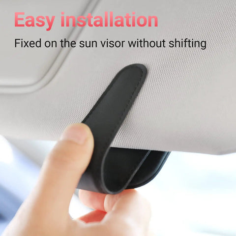 Heavy Duty Magnetic Sunglass Holder For Car Sun Visor With Secure Snap Clip And Soft Leather Wrap One Handed Eyewear Organizer showing easy installation on sun visor.