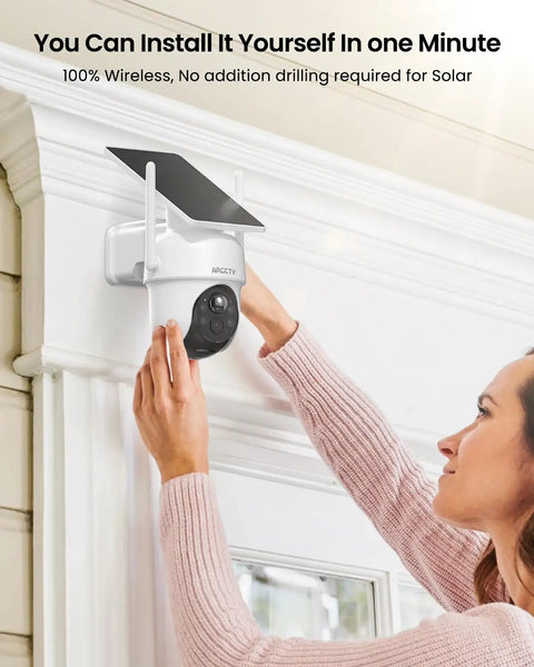 Person installing Wireless Outdoor Security Camera System With Solar Power 4 Camera 4MP HD Surveillance Base Station Local Storage