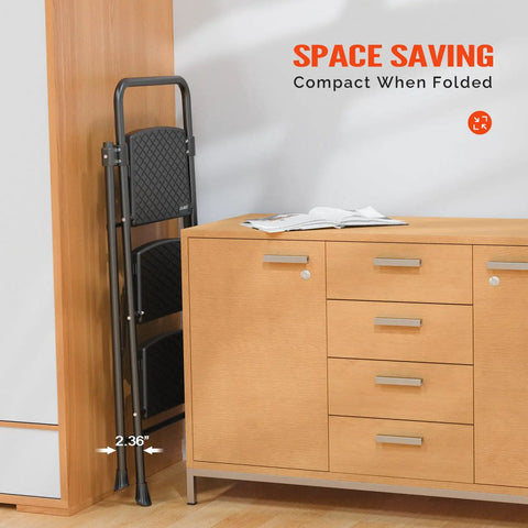 2 Step Folding Ladder for Home and Shop, Lightweight Steel Construction with Hand Rail and Non Slip Wide Pedals, folded beside cabinet