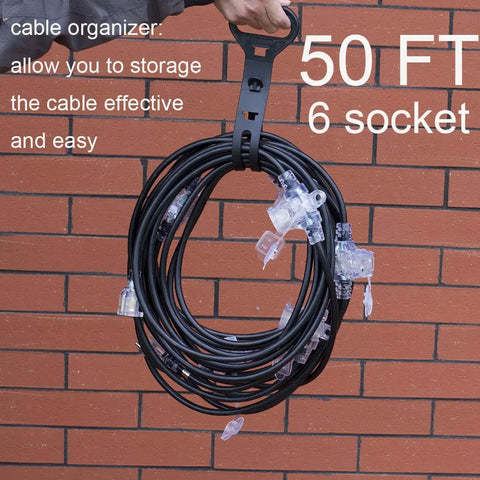 50Ft Outdoor Power Extension Cord With Seven NEMA 5 15R Outlets coiled with handle against brick wall