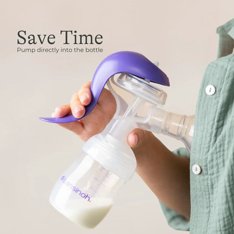 Soft Anti Colic Nipples For Everyday Bottle Feedings Paired With 5 Oz Breastmilk Storage Bottles In A Four Pack For No Sweat Pumping And Cool Freezer Stash, showing a purple breast pump with 5oz bottle.