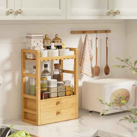 Bamboo Bathroom Countertop Organizer With 2 Tier Makeup Storage And 2 Drawers, holds bottles and jars, kitchen setting.