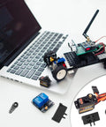 SCX24 Servo Steering Upgrade Kit With Metal Mount Bracket And Horn For RC Cars And Boats on laptop with components
