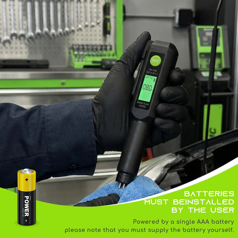 Hella Accurate Brake Fluid Tester Pen With Built In Alarm Warning For Quick Water Content Checks On Dot3 Dot4 Dot5.1 Hydraulic Systems And Rust Resistant Probe held with a blue cloth.