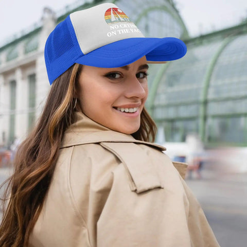 Woman wearing Vintage Womens Golf Trucker Hat In Royal Blue With Washed Distressed Low Profile Look Anti Sweat Band For Dry Comfort Easy To Match With Dressy Or Casual Sweatshirts Breathable Baseball Cap For Sports And Everyday Vibe, smiling outdoors.