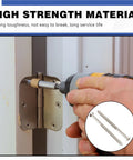 Person using Workhorse 3 Inch Satin Nickel Wood Screws One Hundred Pack to secure a door hinge with a power drill.