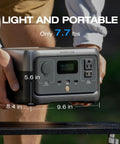River 2 Portable Power Station 256Wh LiFePO4 Battery With 1 Hour Fast Charging shown in outdoor setting