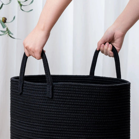 Hands holding Tall Black Woven Rope Laundry Basket, Modern Hamper For Clothes, Blankets, Toys, Towels And More, 15 X 20 Inch (58L) Bin