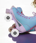 4 Piece Luminous PU Roller Skate Wheels Set With LED Light For Outdoor Quad Skates attached to blue skates