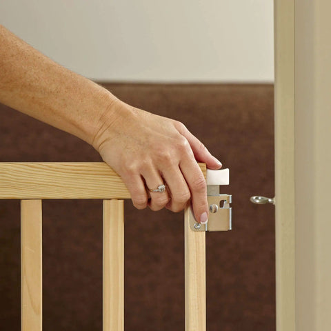Hand installing Adjustable Wooden Baby Gate For Stairs From 28 To 42 Inches Wide And 30 Inches Tall, Kid Friendly Safe Gate