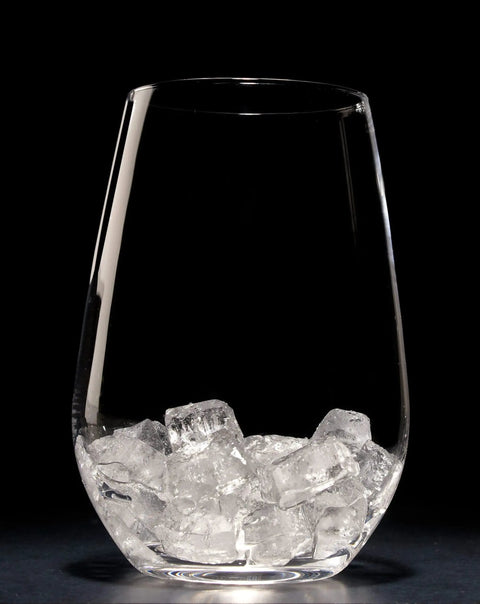 Badass Commercial Cubelet Ice Machine Featuring Efficient Air Cooled Design And Generous Built In Storage Bin Cranks Out 300 Pounds Daily Of Smooth Nugget Ice For Busy Restaurants filled glass with nugget ice cubes, against black background.
