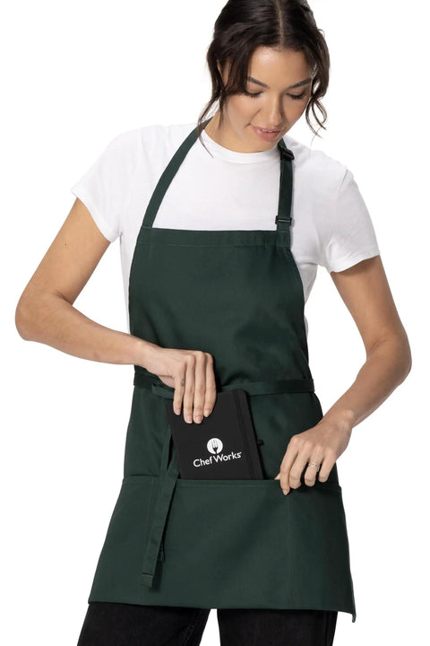 Unisex Three Pocket Hunter Green Apron With Adjustable Neck Strap And Waist Ties, Durable Waitress Kitchen Apron in cafe setting