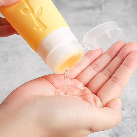 Carry On Ready Travel Bottles Kit 16 Pack TSA Approved Leak Proof Silicone Squeezable Containers for toiletries in use
