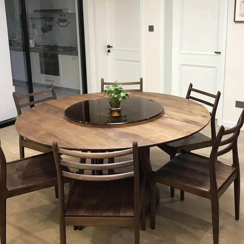 Kick Back Heavy Duty Tempered Glass Lazy Susan Turntable 31 To 35 Inch round swivel serving tray on wooden dining table