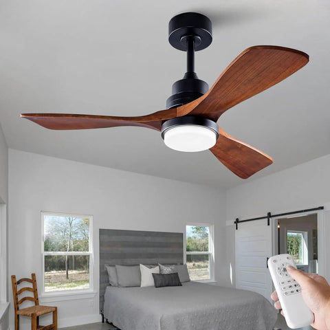 Lit 42 Inch Black Ceiling Fan With Remote And Lights Dimmable LED Quiet Reversible DC Motor in a modern bedroom setting